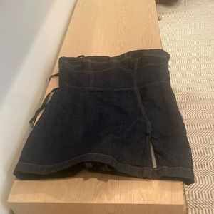 Dark blue denim romper. Hidden shorts so looks like a dress.